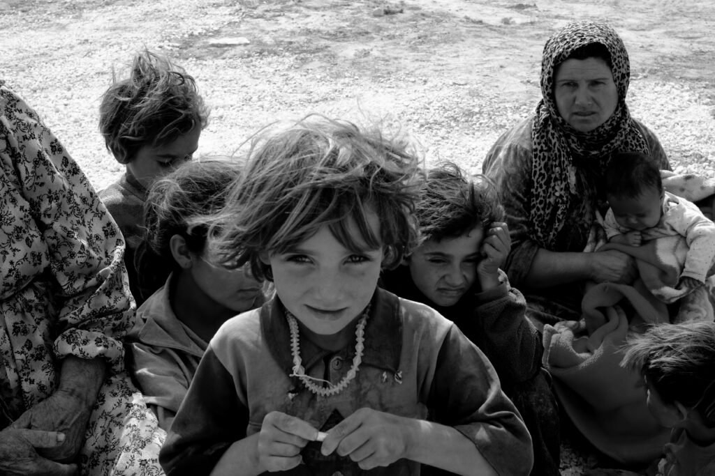 Powerful black and white portrait of a Middle Eastern family in Suruç, Turkey.